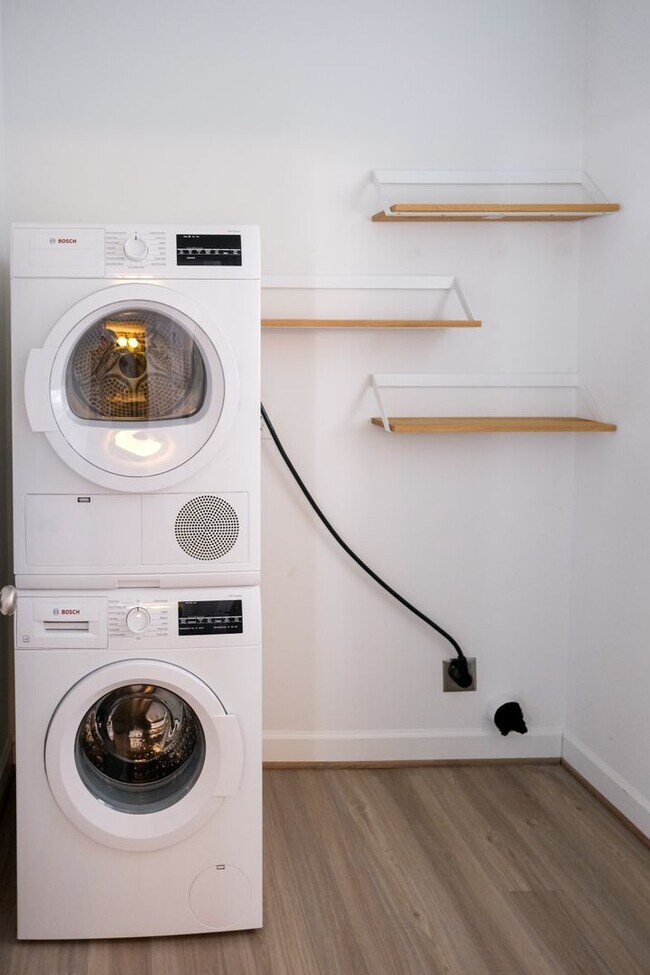 Building Photo - Like-new 3 bedroom, 2.5 bath house with an organic pond!