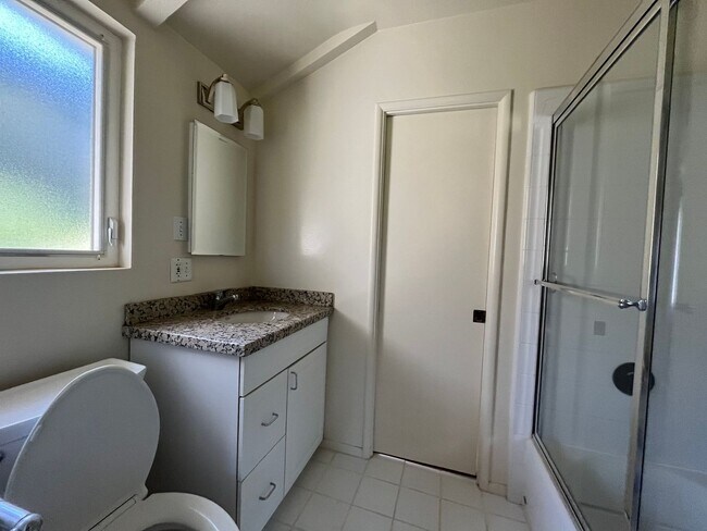 Building Photo - A hidden gem with tree-top view. Tranquil and private. Light and airy