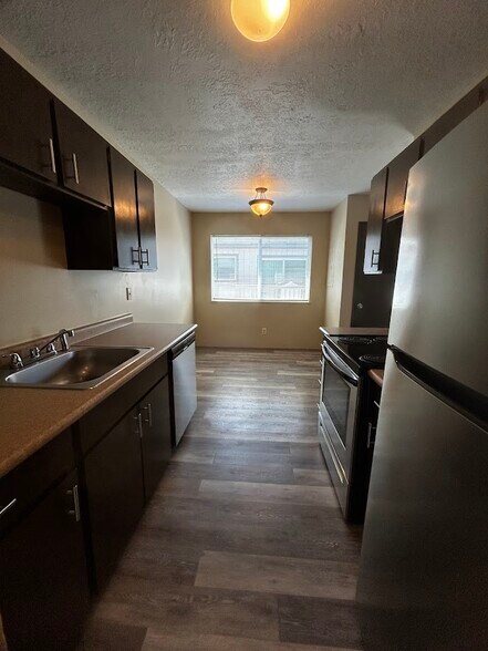 Kitchen with separate dining room area - 3808 SE Cesar Estrada Chavez Blvd