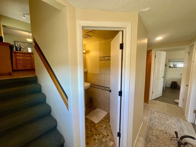 Building Photo - Expansive 5-bedroom, 2.5-bath home with incredible mountain views!