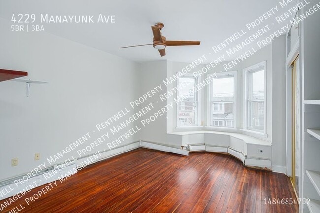 Building Photo - 5BR 2.5 BA_ 2,000 Sq Ft. Townhome in Manay...