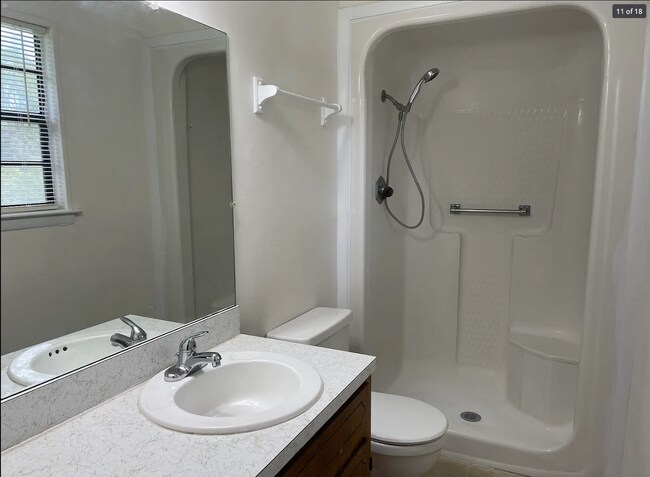 Primary Bathroom with stand up shower and plenty of storage - 714 Woodland Dr S