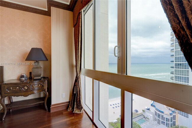 Building Photo - 16047 Collins Ave