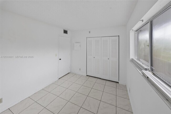 Building Photo - 8750 N Sherman Cir