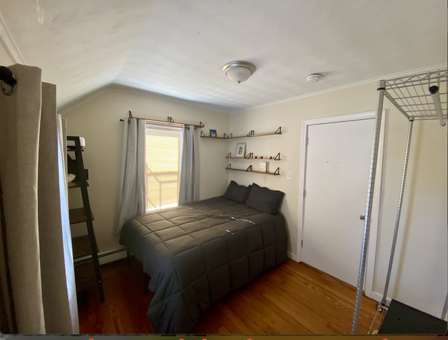 Bedroom 2 with closet and clothing rack - 4 Pond St