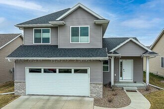 Building Photo - NE Side 2 Story -  4 Bedrooms - Linn Mar Schools - Attached Garage - New Flooring
