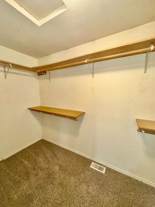 Building Photo - Check out the private fenced backyard!