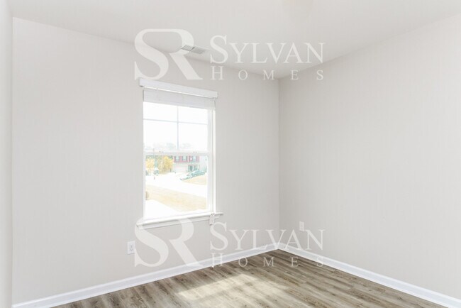 Building Photo - Prepare to fall in love with this 4 bedroom, 2.5 bathroom home