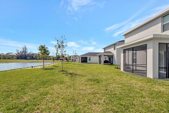 Building Photo - Luxurious Living: Spacious 5-Bedroom Home with Scenic Views in Port Saint Lucie!