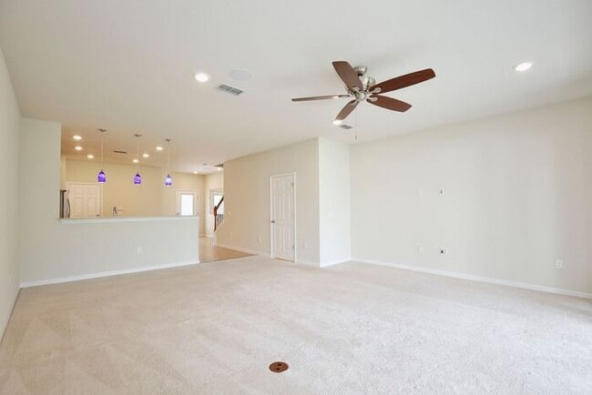 Building Photo - Immaculate Townhome · Dual En-Suite Bedrooms + Flex Loft · Cable & Internet Included · 3.5 Miles ...