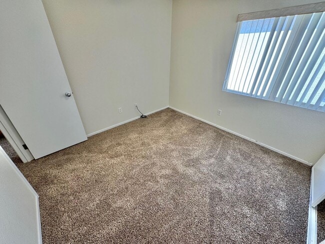 Building Photo - WELCOME TO THIS SPACIOUS 4-BEDROOM, 2.5-BA...