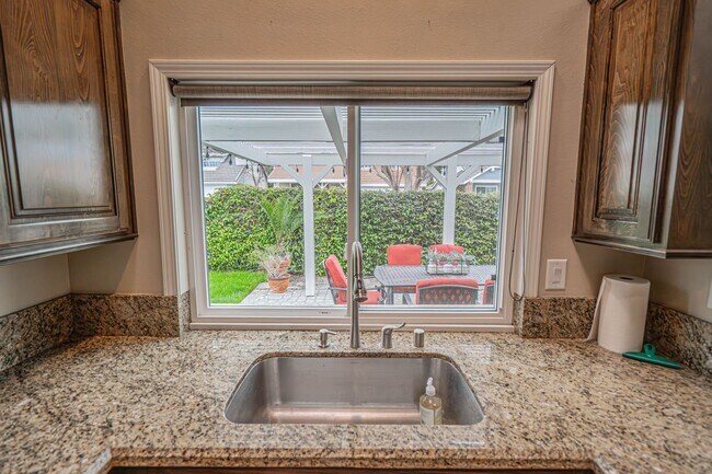 Building Photo - COMING SOON! Charming 2-Bedroom Home with a Versatile Loft in The Bungalows of Valencia!