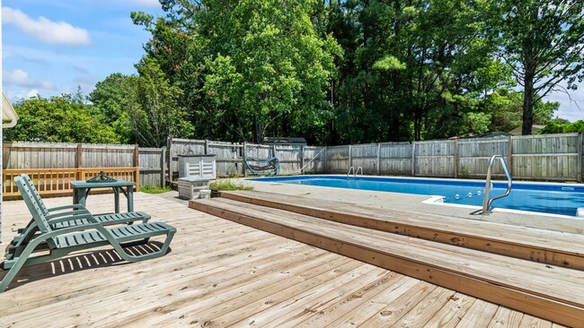 Building Photo - Home with In-ground Pool!