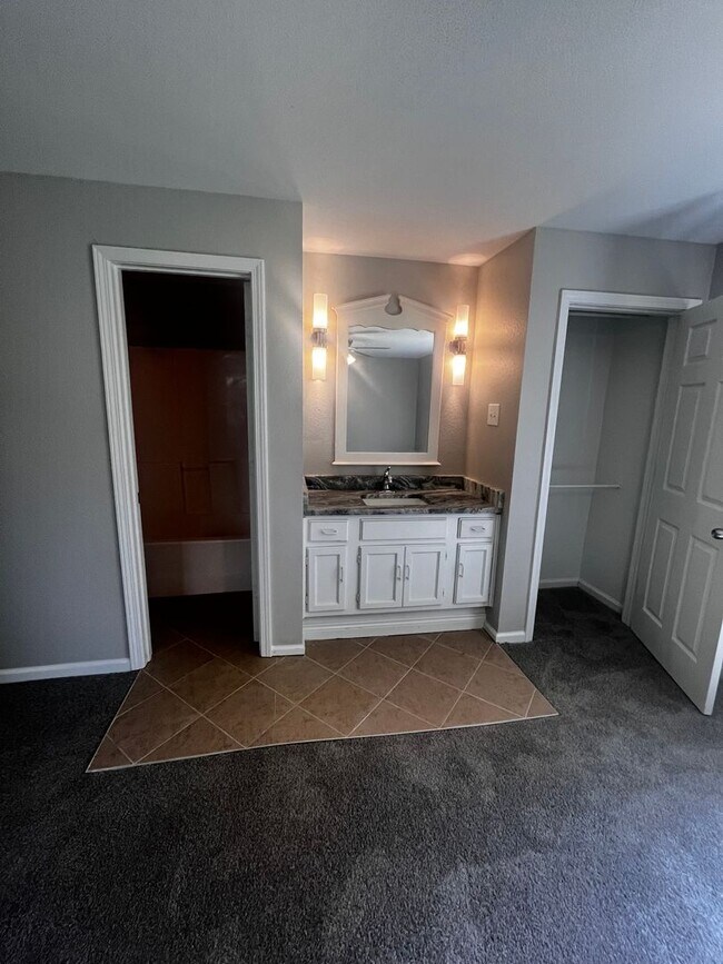 Building Photo - Freshly updated home with privacy fence in...