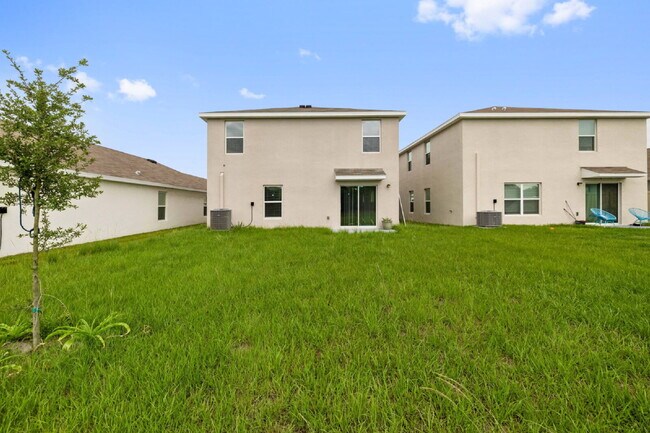 Building Photo - "Spacious 5-Bedroom Haven with Stunning Lake Views & Granite Elegance in Riverview!"
