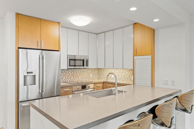 Building Photo - Stylish 1-Bedroom Unit at THE COLLECTION w...