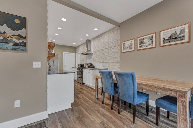 Building Photo - Furnished 1-Bedroom Lower Apartment on Main St
