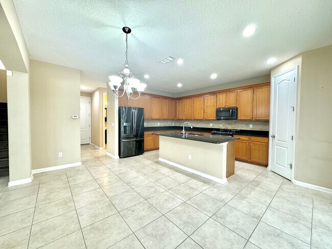 Building Photo - Spacious 4-Bedroom Home with Outdoor Oasis...