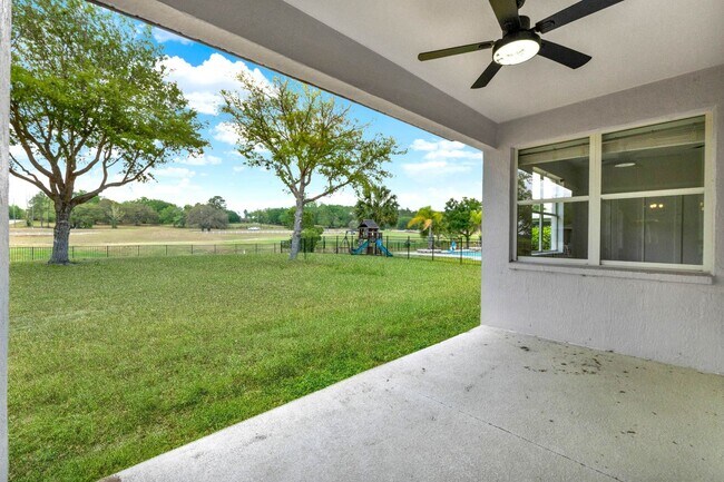 Building Photo - RENOVATED 5 BEDROOM FENCED IN, GOLF FRONTA...
