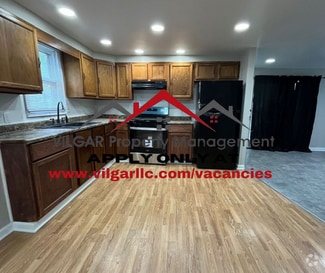 Building Photo - Step into this fully refreshed 5-bedroom, ...