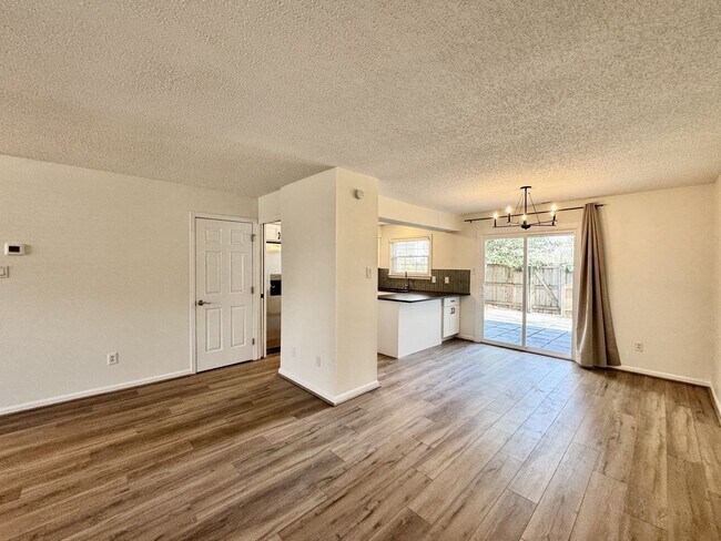 Building Photo - Completely Renovated & Ready 02-25-26! 2 Primary Suites, All Appliances Convey and Dog-Friendly!