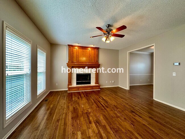 Building Photo - Beautiful Four-Bedroom Home with Three Car...