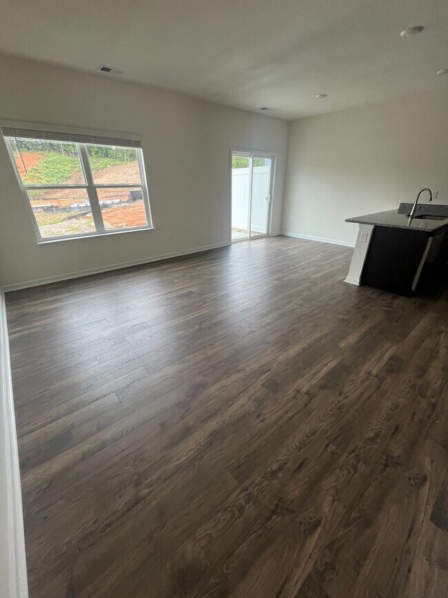 Building Photo - Brand New Townhome – Modern Comfort & Conv...
