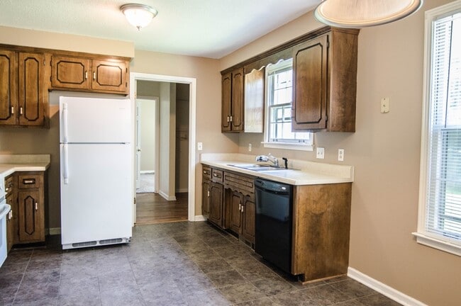 Building Photo - Dog Friendly Two Story with Fenced Yard!
