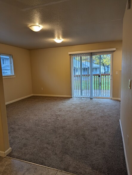 Living room (apartment complex behind duplex) - 713 E Main St