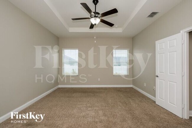 Building Photo - 5952 Valentino Way