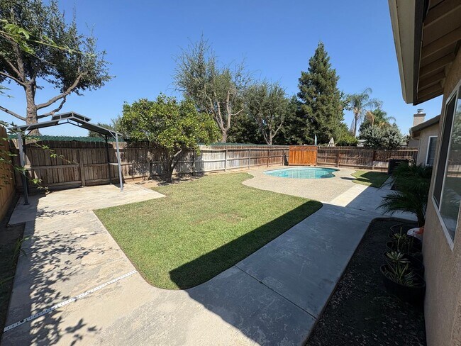 Building Photo - Beautiful home with pool Available Now!