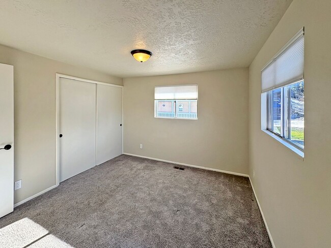 Building Photo - 3-Bedroom Boise Home with Outdoor Fireplace, Fenced Yard & LVP Flooring Near Downtown | $500 Off ...