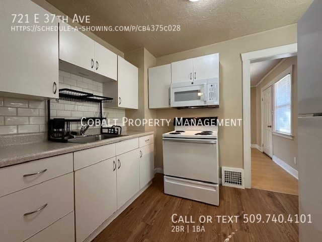 Building Photo - 721 E 37th Ave