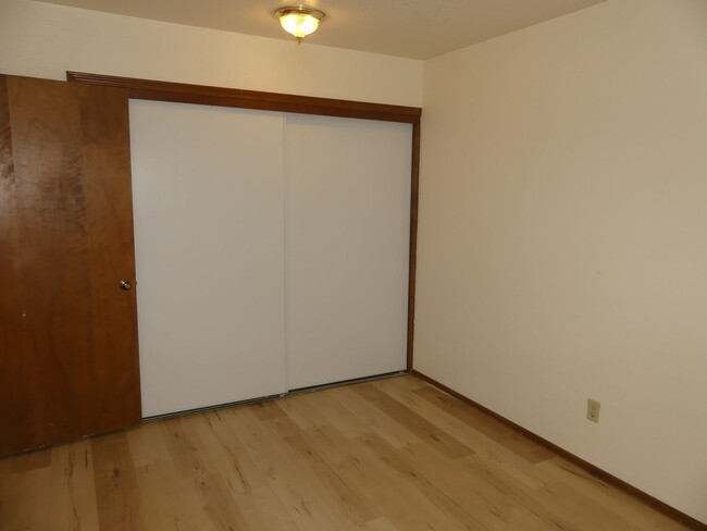 Building Photo - Wood Village End Unit Condo * Covered Park...