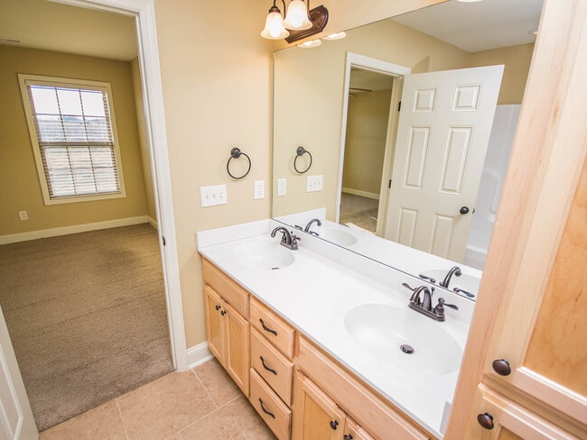 Building Photo - Minutes to Mazda Toyota and Amazon. Fenced back yard