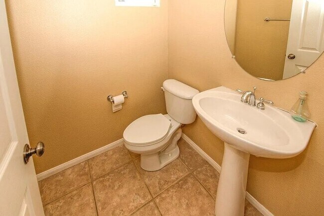 Building Photo - 13210 Petunia Avenue