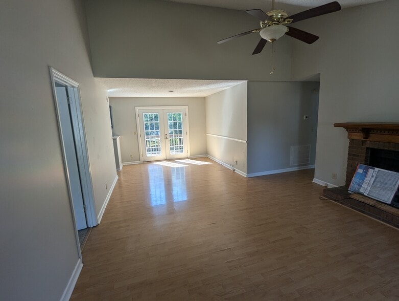 Front room. Tall ceilings and lots of natural light - 1528 Stone Hill Rd