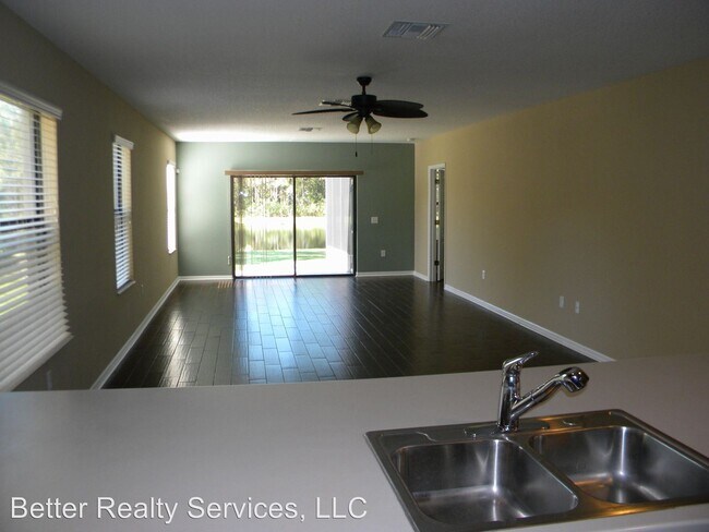 Building Photo - 4 br, 2.5 bath House - 7834 TUSCANY WOODS DR,