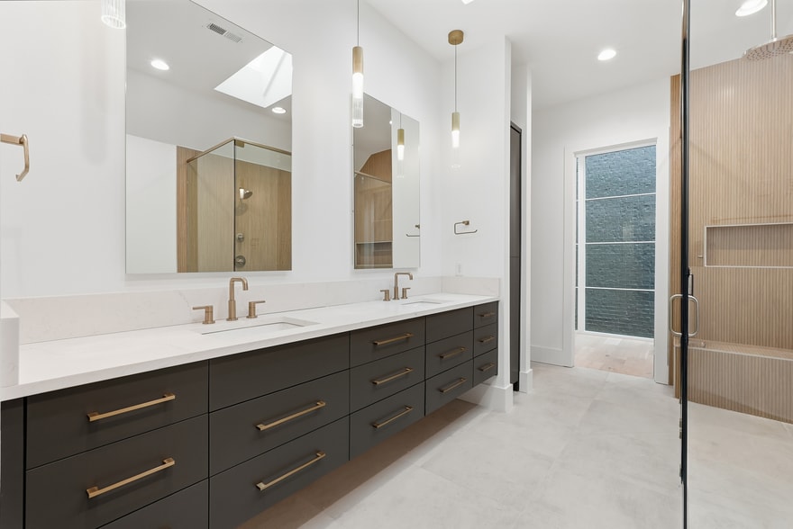 Modern bathroom featuring clean finishes, sleek fixtures, and a bright, refreshed feel - 3718 West End Ave
