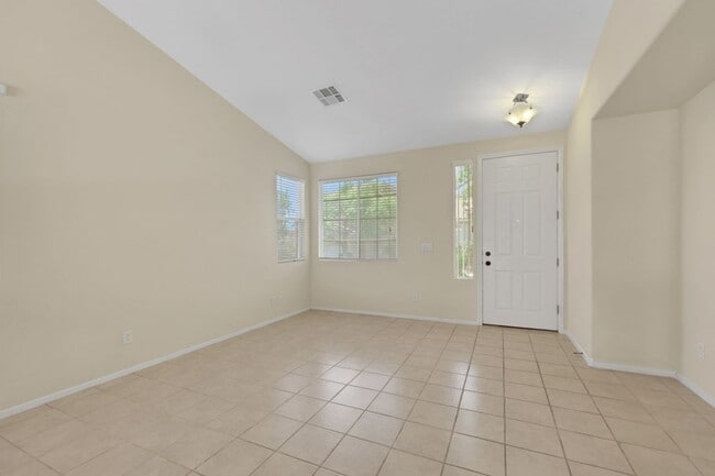 Building Photo - This beautifully updated 2-bedroom home is nestled in a gated community
