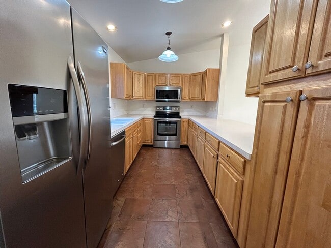 Building Photo - Stylish, Spacious 3 Bedroom Townhome with Two-Car Garage