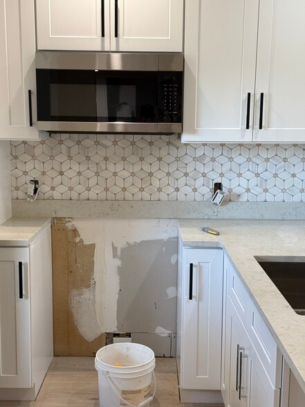 Kitchen before appliances - 126 S Cypress Rd