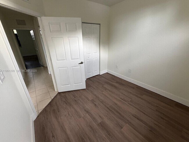 Building Photo - 3390 NE 13th Cir Dr