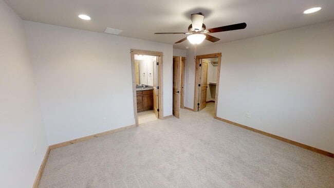 Building Photo - Spacious Townhome with Central Heat/Air - Two Car Garage, Fenced in Backyard! **EARLY BIRD PRICIN...