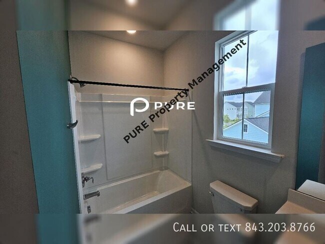 Building Photo - 203 Magnolia Garden Dr