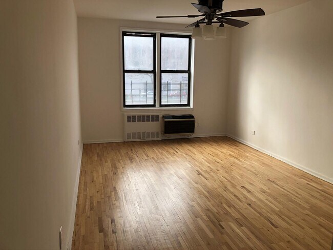 Building Photo - 10025 Queens Blvd