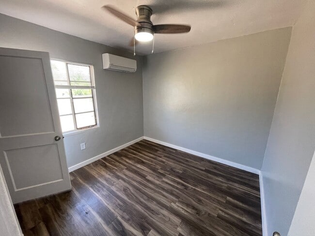 Building Photo - OPEN HOUSE! Remodeled Two Bedroom, End Unit with A/C and Large Fenced Yard