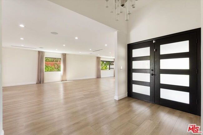 Building Photo - 11700 Woodley Ave