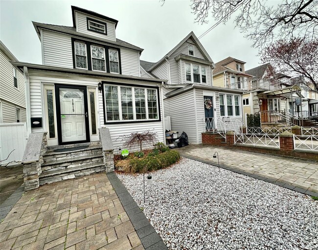 Building Photo - 68-19 Kessel St