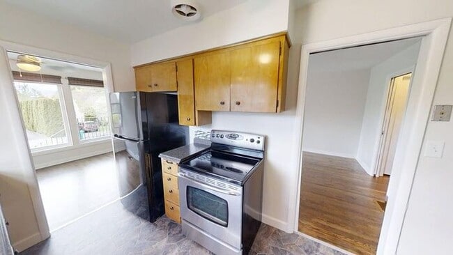 Building Photo - Sun-Drenched Mt. Tabor Home with Massive Yard & Oversized Shop-Garage!